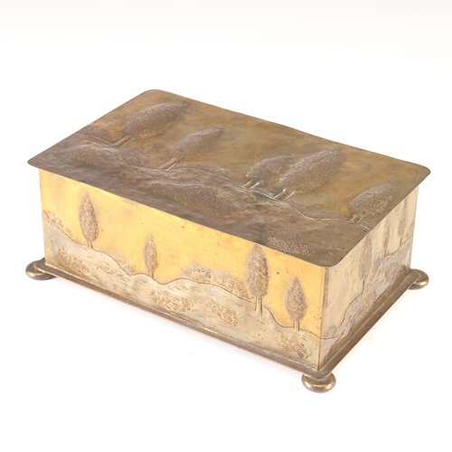 APOLLO STUDIOS Hammered brass hinged humidor, its: APOLLO STUDIOS Hammered brass hinged humidor, its lid and sides embossed with poplar trees on a copper-patinated hilly landscape. Complete with sponge holder. Apollo Studios New York 713. 4" x 10 3/4"