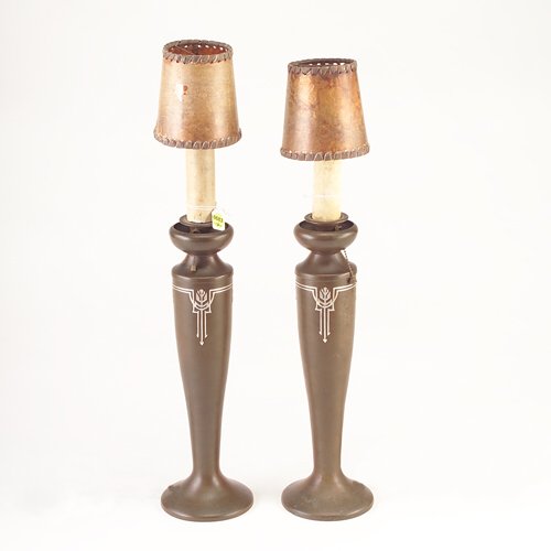 SILVERCREST Pair of Sterling-on-Bronze candlestick: SILVERCREST Pair of Sterling-on-Bronze candlestick lamps with geometric overlay on bronze patina, topped with candlesticks and mica shades. Good original patina, small loss to mica covering. Marked. M