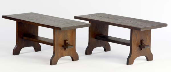 GUSTAV STICKLEY Pair of trestle benches with keyed: GUSTAV STICKLEY Pair of trestle benches with keyed through-stretchers. Paper labels. 15" x 36" x 15" Very good new finishes.
