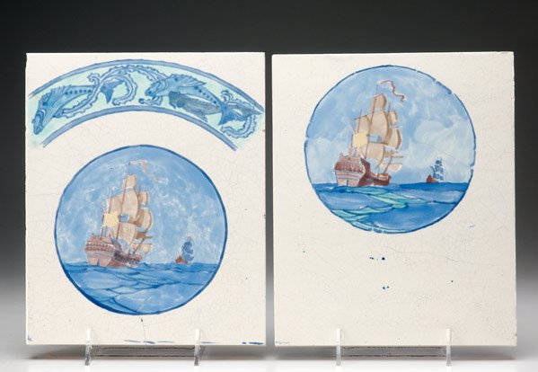 MARBLEHEAD Two study plaques painted with ships: MARBLEHEAD Two study plaques painted with medallions of ships against a white ground, one with banded fish design above medallion. Complete with period photographs of similar medallions on a pair of m