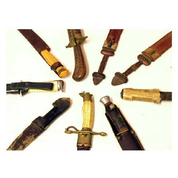 Armour - Nine miscellaneous knives, several contai: Armour - Nine miscellaneous knives, several contained in leather sheaths, some African, some Indian with brass mounts, a German sheath knife, some with bone handles. (9)