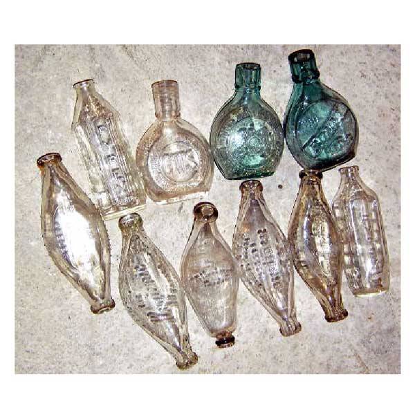 Glass - Ten glass baby feeding/mixing bottles: a: Glass - Ten glass baby feeding/mixing bottles: a Boony feeder, the National Improved feeder, a CWS Newcastle feeder, two Pyrex hexagonal mixing bottles, a Radiant feeder, two Hygenic feeders, an Allen
