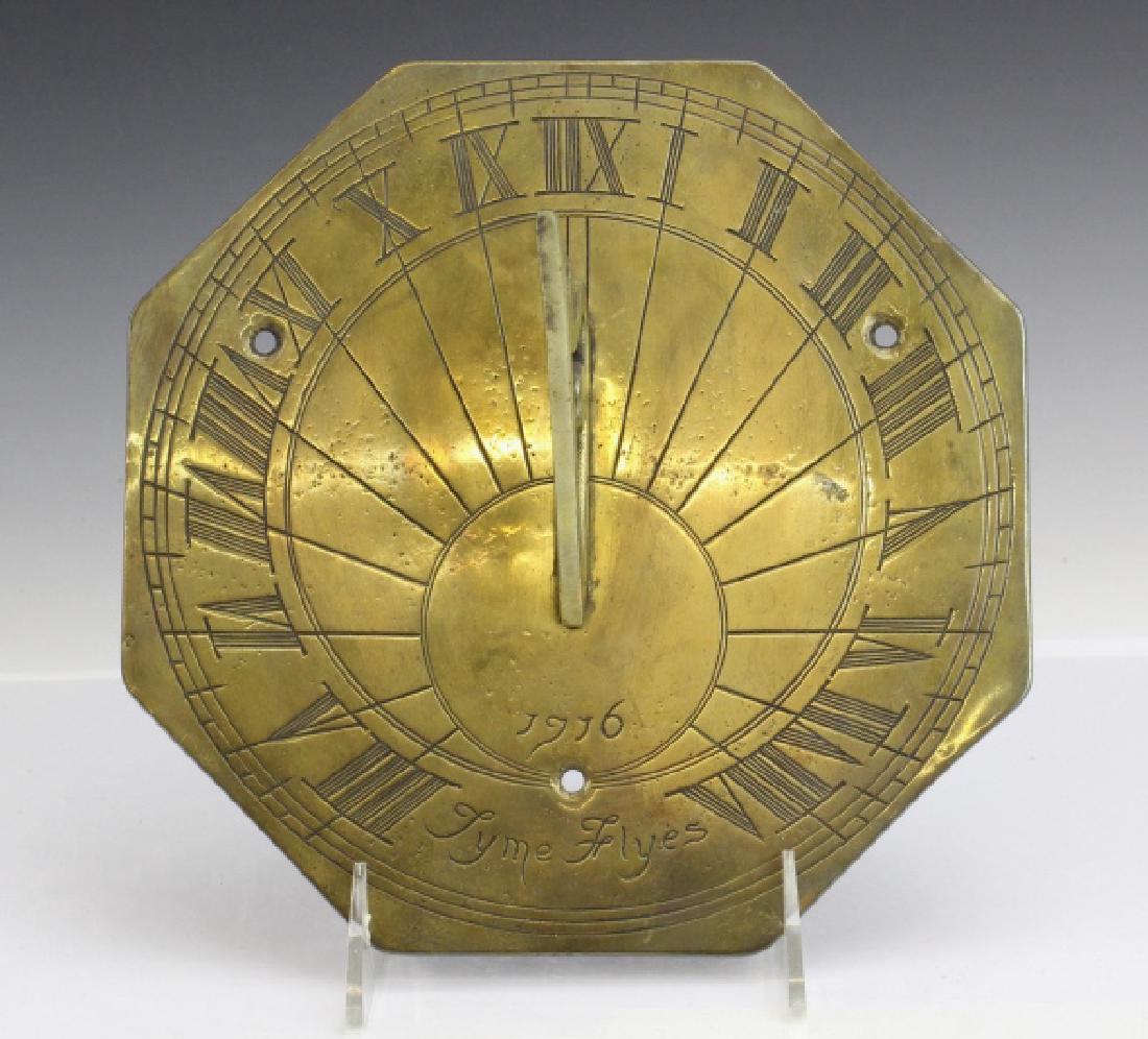 18c Style Engraved Brass Tyme Flyes Sundial: Crafted of brass with engraved Roman numeral indicators. Engraved Tyme Flyes with date. Believed to be a centennial model. Measures 3 3/4" x 8" Good condition with nice patina. Attached partial label