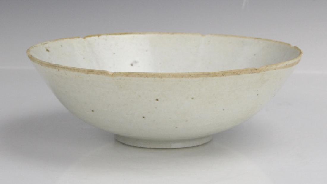 Sung Dynasty White 8 Lobed White Ware Bowl: Antique Chinese Sung dynasty 8 lobed white ware porcelain bowl with iron spots from glazing. Unglazed rim. Very good condition with minor wear. Comes in fitted case. Measures approximately 6 3/4" x 2 