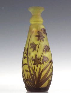 Galle French Cameo Etched Art Glass Lily Vase: Emile Galle, Nancy Lily floral pattern vase. Crafted of fine quality French art glass. Acid etched cameo design with a floral spray of what appear to be lily flowers. Light purple cut to yellow amber