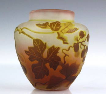 Galle French Etched Cameo Art Glass Grape Vase: Emile Galle, Nancy Wild Grape pattern vase. Crafted of fine quality French art glass. Acid etched cameo design with grapes and vines with leaves. Deep amber cut to yellow with pink and clear