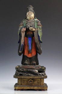 Chinese Carved Wood Polychrome Female Diety Statue: Hand carved and gesso wood with painted and gold gilt finish. Features a female deity carrying a pot. Measures 18 3/4" x 7" Good condition with surface wear and losses. In house USA continental