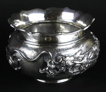 Japanese Meiji Period Silver 3 Toed Dragon Vase: Crafted of 950 fine silver. Features a repousse decorated exterior with fierce dragon motif. Signed with Japanese hallmarks on bottom. Measures 4 1/2" x 7 1/2" Total weight approximately 628 grams.