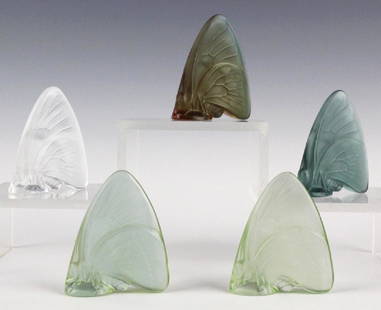5 x LALIQUE France Art Glass Butterfly Figurine: Lot of five Lalique butterfly figurines. Crafted of fine French crystal. Features a well detailed butterfly motif with a frosted surface. There is one clear, one blue, one red and two light green.