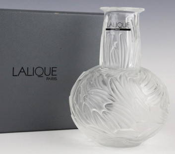 LALIQUE France Plumes Frosted Crystal Bud Vase: Lalique plumes pattern vase. Crafted of fine french crystal. Features frosted, feather like, plumes on a bulbous body and narrow neck. Comes with original box. Signed Lalique France. Measures 5 1/4"