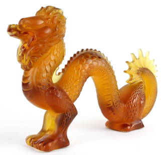 Lalique French Art Glass Amber Dragon Sculpture LG: A very impressive and large figurine/sculpture made by LALIQUE. Crafted of fine quality French colored art glass. Depicts a large Chinese dragon in stunning amber color. Signed Lalique France.