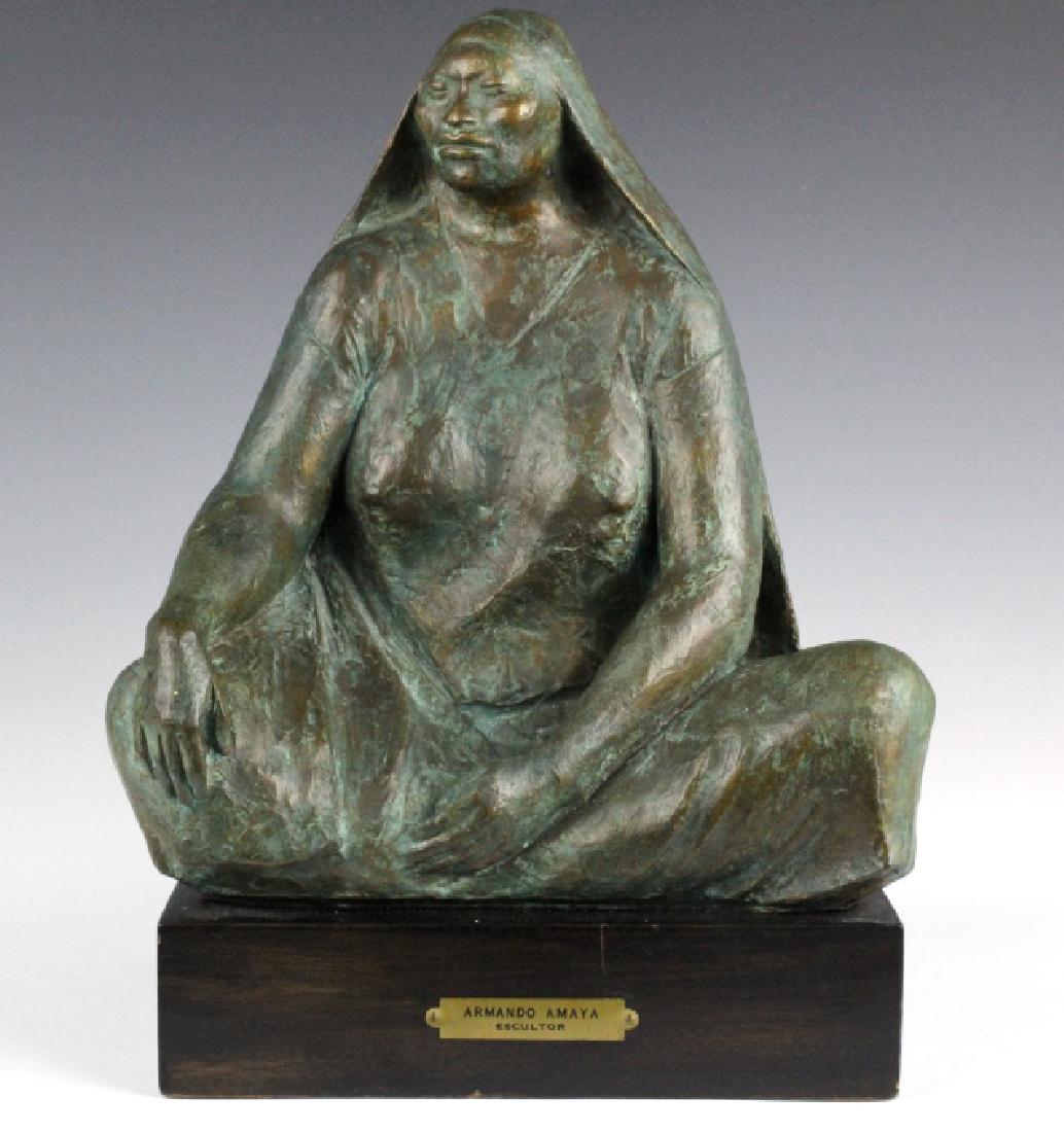 ARMANDO AMAYA Female Nude Bronze Sculpture SIGNED: Signed and dated bronze sculpture by Armando Amaya (1935- Mexico). Crafted of cast bronze with deep green to brown patina. Depicts a female nude in a seated position. Mounted on a wooden base. Signed 