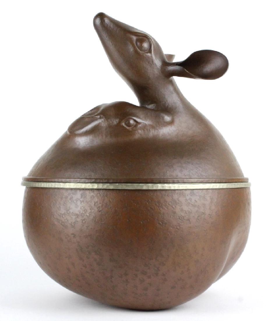 Exquisite Hammered Mixed Metals Copper Fawn Vessel: Fine copper and silver tone metal hand hammered vessel. Crafted of copper and silver over copper. Features the finely hand hammered baby animal motif with the silvered copper bowl resting in a copper 