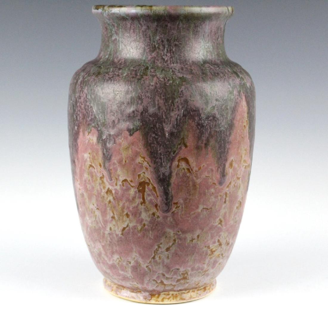 Roseville Art Pottery CARNELIAN II 9" Vase 314-9: Roseville American art pottery Carnelian II vase. Features a layering of pink and purple glaze on a classic form. Unsigned. Measures 9.25". Good overall condition with no chips or cracks. Featured on 