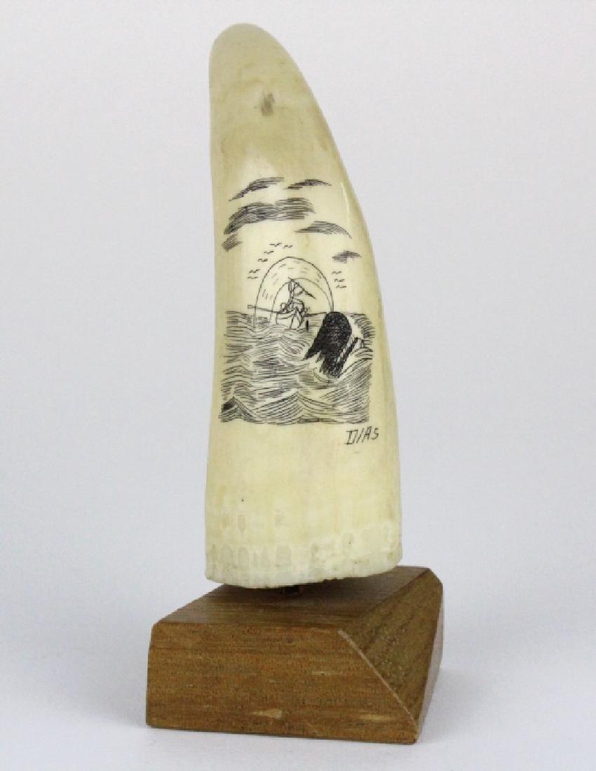Signed DIAS Whale Hunt Scrimshaw Decorated Tooth: Features a hand carved and inked scrimshaw scene of a whale hunt. Signed Dias. Comes with a wooden stand. Measures 3 3/4" x 1 3/8" Good condition with mild wear. In house USA continental shipping $25 