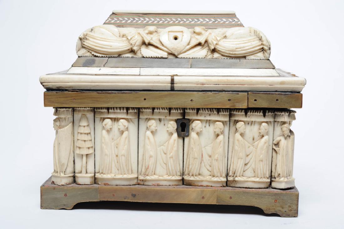 Antique Folk Art Figural Carved Bone Reliquary BOX: Features base of robed figures, possible apostles with shield bearing figures on corners on top of a horn veneered platform. Top with marquetry inlaid border with twist design. Tiered and topped with
