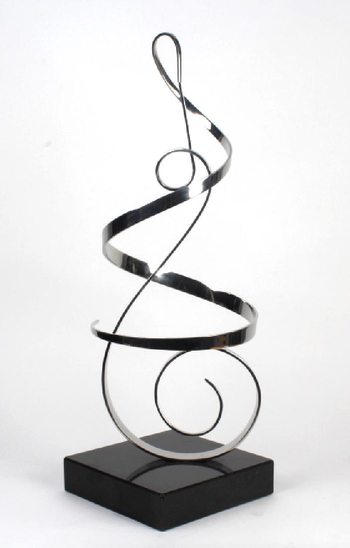 Gary Traczyk Modern hrome Kinetic Sculpture 28": Signed original kinetic scullpture by Gary Traczyk (21st Century Miami) Features a stylized musical note with well balanced rotating top element in chrome finish. Black granite base. Signed G. Traczyk