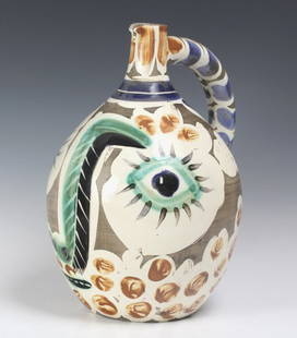 Pablo Picasso Visage au nez Madoura Art Pottery Pitcher: Pablo Picasso, (Spanish, 1881-1973), Titled: "Visage au nez noir". Rare earthenware clay pottery pitcher hand painted and partially glazed. One of the most varied surfaces from throughout Picasso's