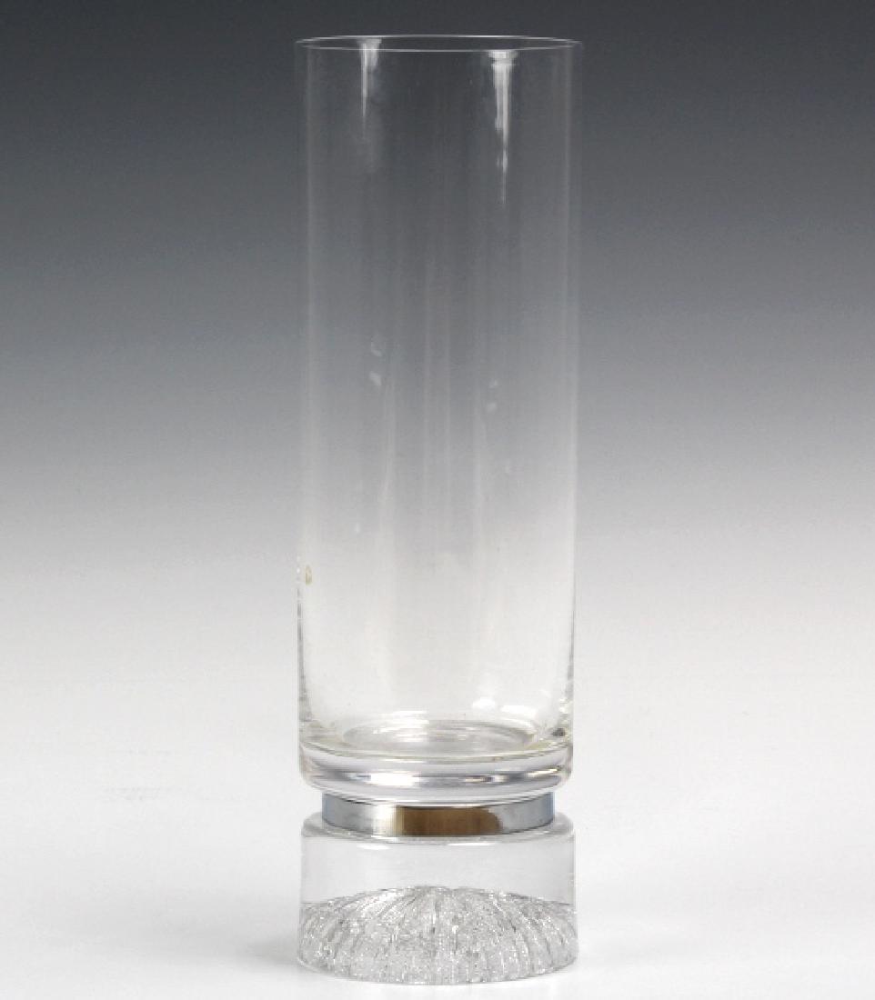 Daum French Art Glass Brutalist Modern 9" Vase: Crafted of fine quality French art glass crystal. Features a clean mid century modernist design with brutalist style base. Signed Daum in script. Measures 9 5/8" x 3". Good condition with mild surface