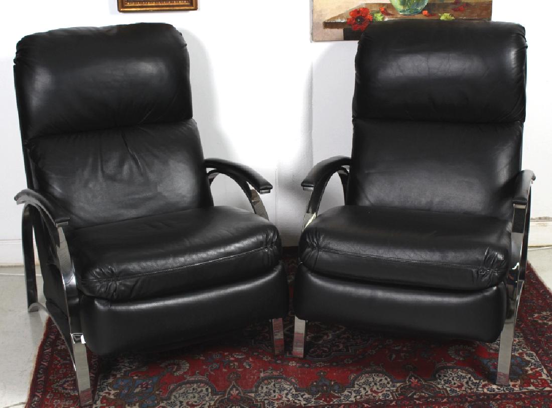 Pr Contemporary Black Leather Chrome Lounge Chairs: Features a clean modernist design. Black leather recliners with chrome arms and sides. Each measures 40" x 36" x 28". Good condition with mild surface wear. Will not ship. Will refer a local shipper.