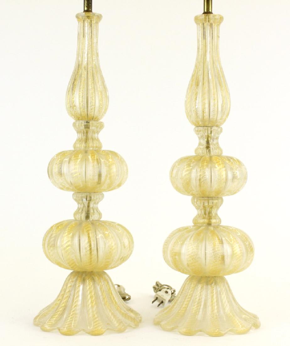 Murano Italian Gold Art Glass Lamps Barovier Toso: Stunning pair of vintage Murano lamps. Crafted of hand blown Italian art glass. Features flared foot with double lobe design. All over gold cordonato oro pattern. Attributed to Barovier & Toso. Each m