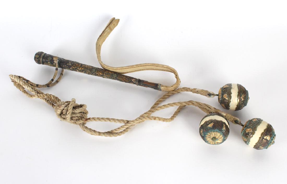 Antique Mogul Gilt Metal & Bone Balls, Riding Crop: Antique lot of Mogul balls and a riding crop. Features a group of three 2 1/2" diameter spheres on a twisted leather chords. This lot is accompanied with by a mixed metals and leather riding crop. The