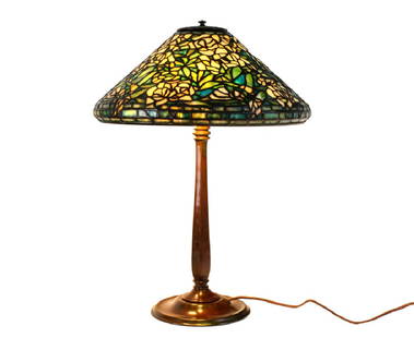 Tiffany Studios White Rose Stained Art Glass Lamp: Table lamp features stained glass shade in the Rose White pattern. Base crated of cast bronze with rich brown patina. Three Bryant socket top. Shade signed Tiffany Studios New York. Base signed Tiffan