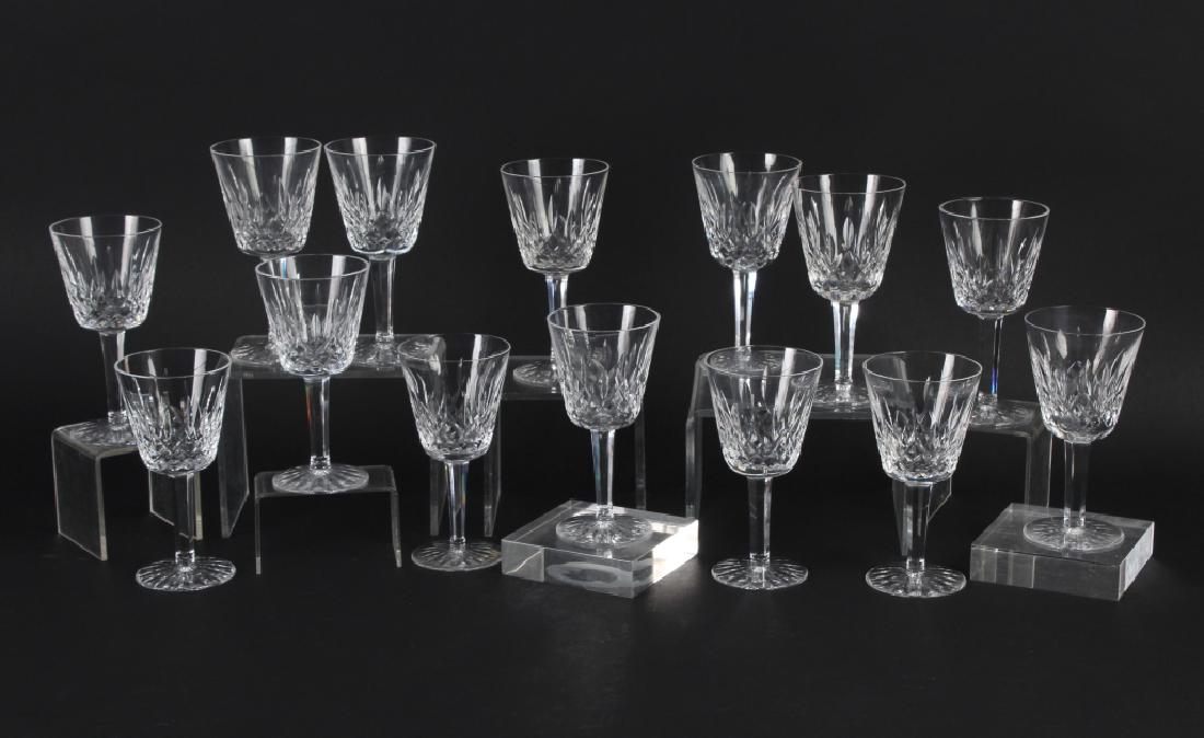 14 Waterford Crystal Lismore Claret Wine Glass SET: Set of 14 signed Waterford 5 7/8" Lismore cut claret wine goblet glasses. Good overall condition with wear consistent with age. In house Hill Auction Gallery continental USA shipping $85 plus insuranc