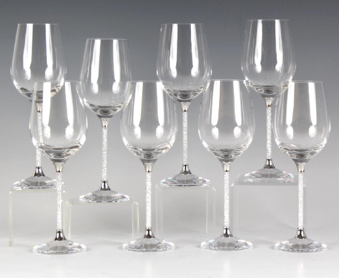 8 Swarovski Crystalline Crystal Wine Goblet SET: Beautiful set of 8 Swarovski Crystalline wine goblets crafted of Austrian silver crystal. Features clear bowl with faceted gem filled stem and cut foot. Signed with the Swarovski mark. Each measures 8