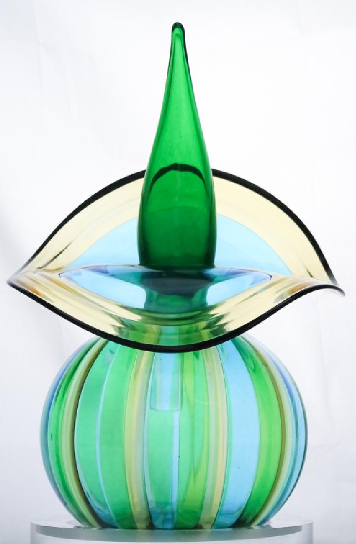 Signed Art Glass Jack In The Pulpit Bottle Stopper: Studio art glass signed decanter and or perfume bottle and stopper. Features a body crafted of stripes of yellow green and blue. With a widely flared rim and black beading around the rim. Features a l