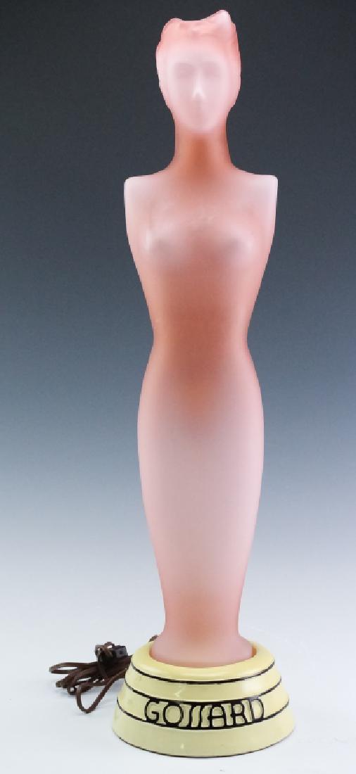 Gossard Pink Art Deco Nude Lady Glass Display Lamp: Rare Gossard Art Deco glass promotional display lamp. Features the form of a nude woman crafted of pink frosted glass and standing on a plaster base reading Gossard. Illuminated from the inside. Measu