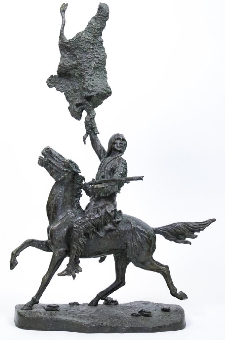 Remington American Indian Horseback Bronze Statue: After Frederic Remington (1861 - 1909) American. Native American bronze sculpture on horse. Figure depicts a Native American on horseback with a black powder gun and truce signal being waved. Signed o