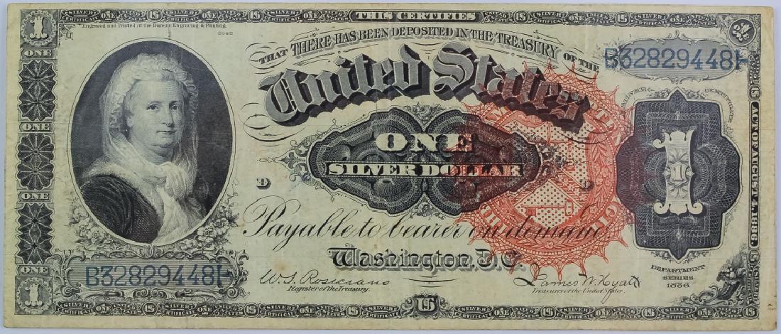Auth. 1886 Martha Washington $1 Silver Certificate: Series 1886 $1 silver dollar currency bill. Features Martha Washington on obverse. Series 1886. Freidberg number 217. Good overall condition with wear consistent with age, no pinholes or tears. Hill A