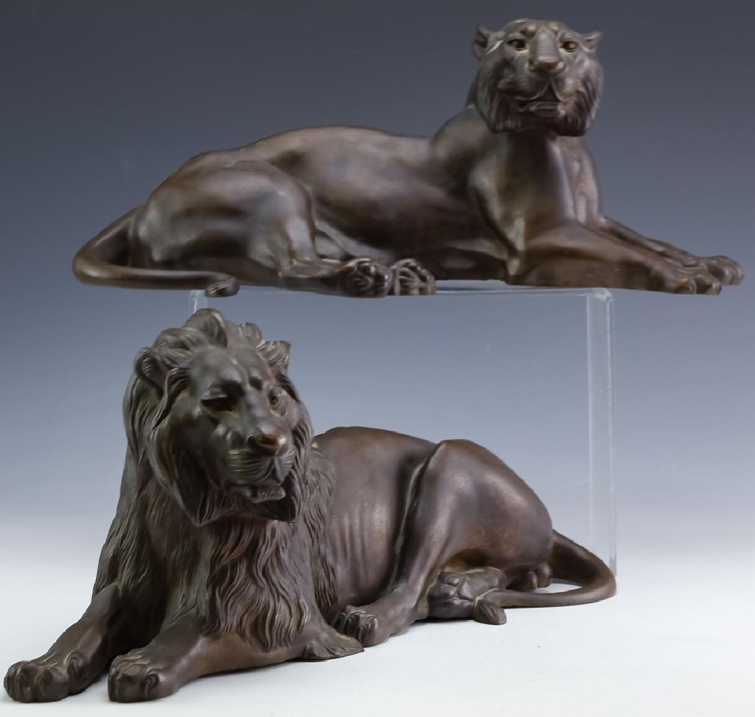 2 Meiji Period Figural Bronze Lions Art Sculptures: Fine pair of antique bronze sculpture of a lion and lioness. Crafted of solid bronze. Features a well detailed pair of sculptures in the form of a lion and lioness in resting positions. No found signa