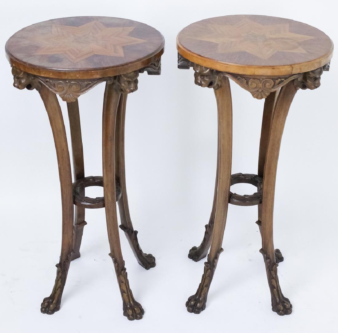 Pair Antique Edwardian Paw Footed Plant Stands: Pair of antique Edwardian era lion paw footed plant stand pedestals. Featuring a four footed design with lion paw and acanthus carved feet in deep relief and carved lion face apron. Topped with satinw