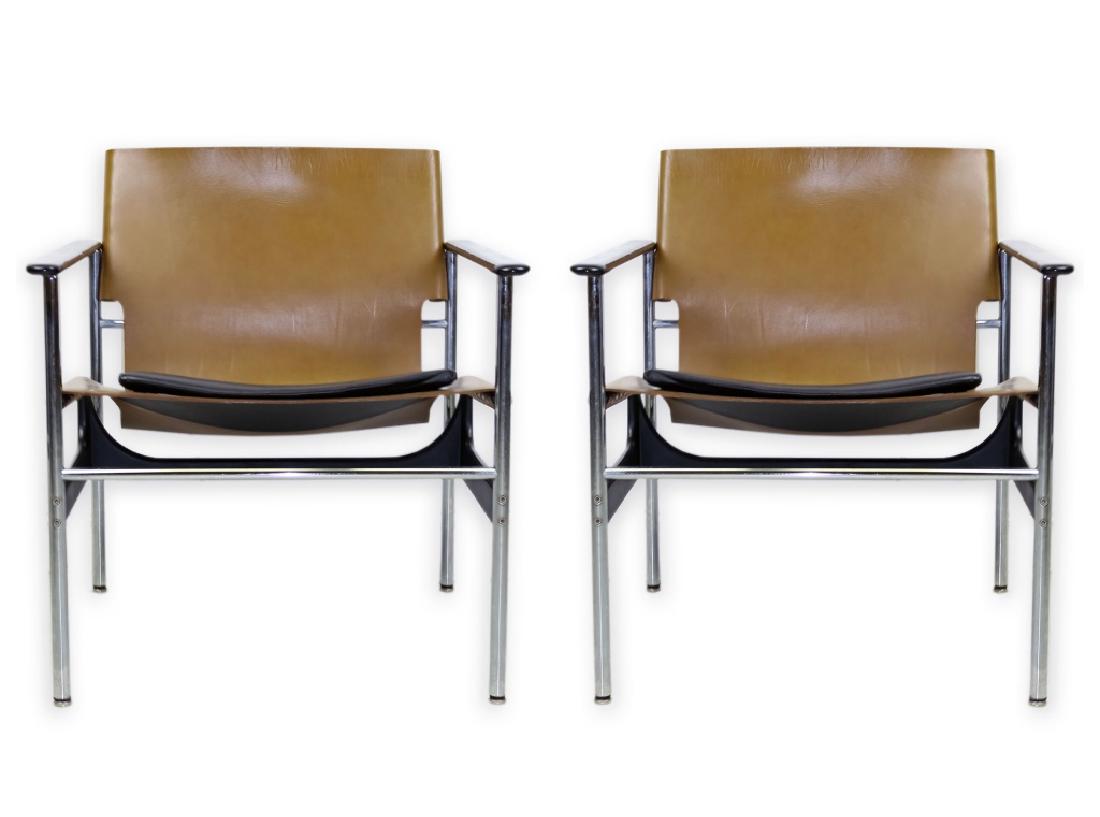 Charles Pollock for Knoll PAIR 657 Sling Chairs: Pair of Charles Pollock for Knoll furniture, Sling armchairs. Features two tone leather on a chrome frame. Measures 28 1/4" x 24 3/4" x 26". Knoll label on underside of cushion. Good overall condition