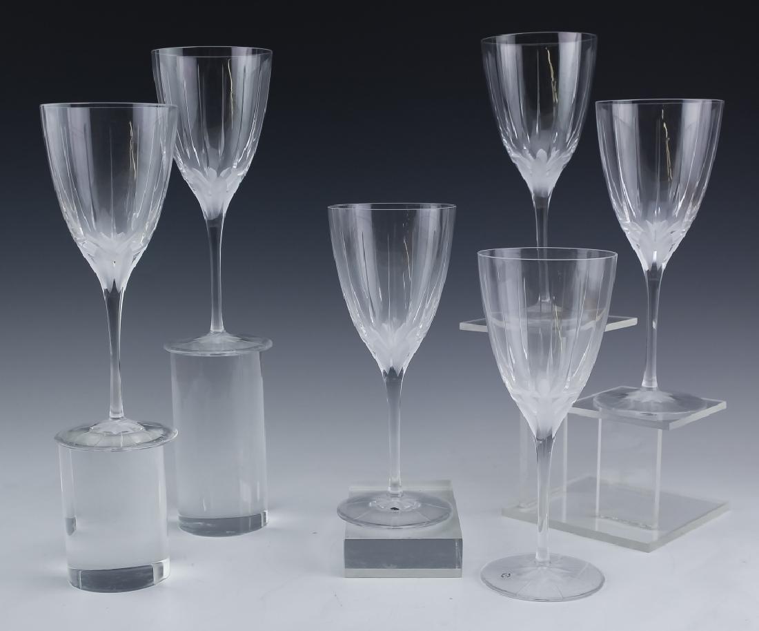 6 Must De Cartier France Crystal Red Wine Glasses: Rare set of six Cartier wine glasses. Guaranteed Authentic. Features the pattern titled: De Must de Cartier. With frosted and clear vertical cuts. Marked Cartier on base. Measures 8 1/8" x 3 1/4". Goo