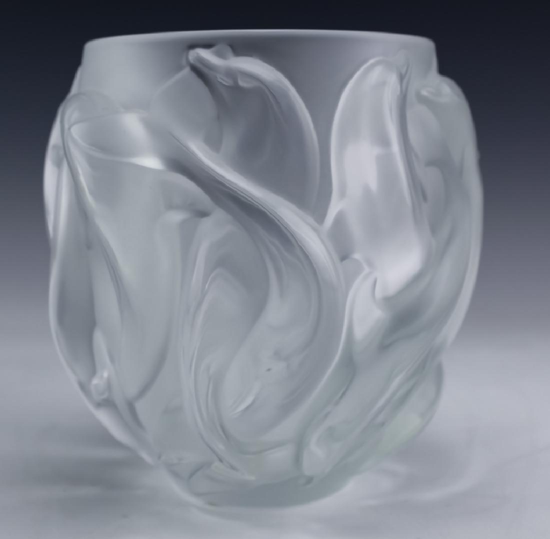 Lalique French Art Glass Figural Dolphin Vase RARE: Signed figural dolphin vase by Lalique. Guaranteed Authentic. Crafted of fine quality French art glass crystal. Features the "Oceania 1" design. Playful frieze of dolphins surround the sides in an art