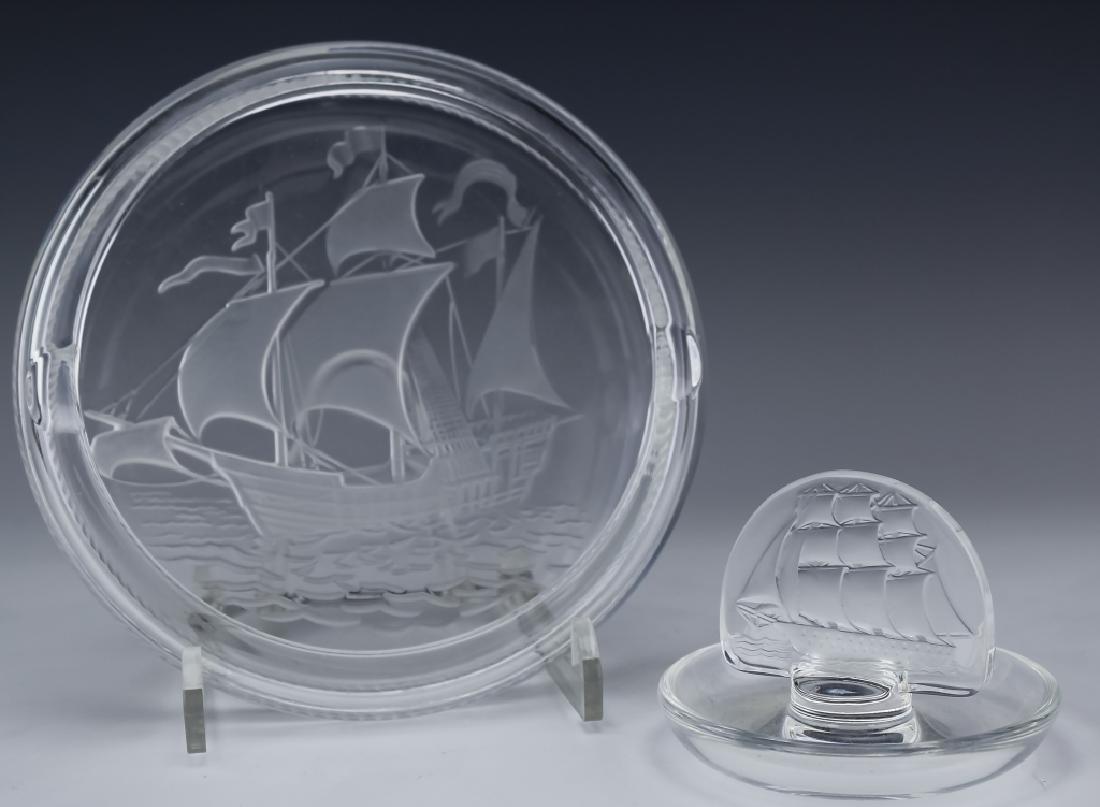 Lalique LOT Crystal Sailboat Ship Pin & Ash Tray: Lalique ashtray and pin tray. Guaranteed Authentic. Features a 6 3/4 diameter ashtray with an intaglio relief image impressed on the base. The pin-tray has a coordinating impressed image on a ship and