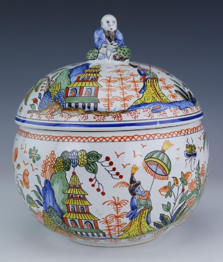 French Chinoiserie D'Hiereville Faience Lidded Jar: French lidded Faience vessel. Guaranteed Authentic. Features a gourd form with figural boy form handle with the lid and body decorated with Asian motifs. Marked Made In France D' Hiereville MD I. Pape