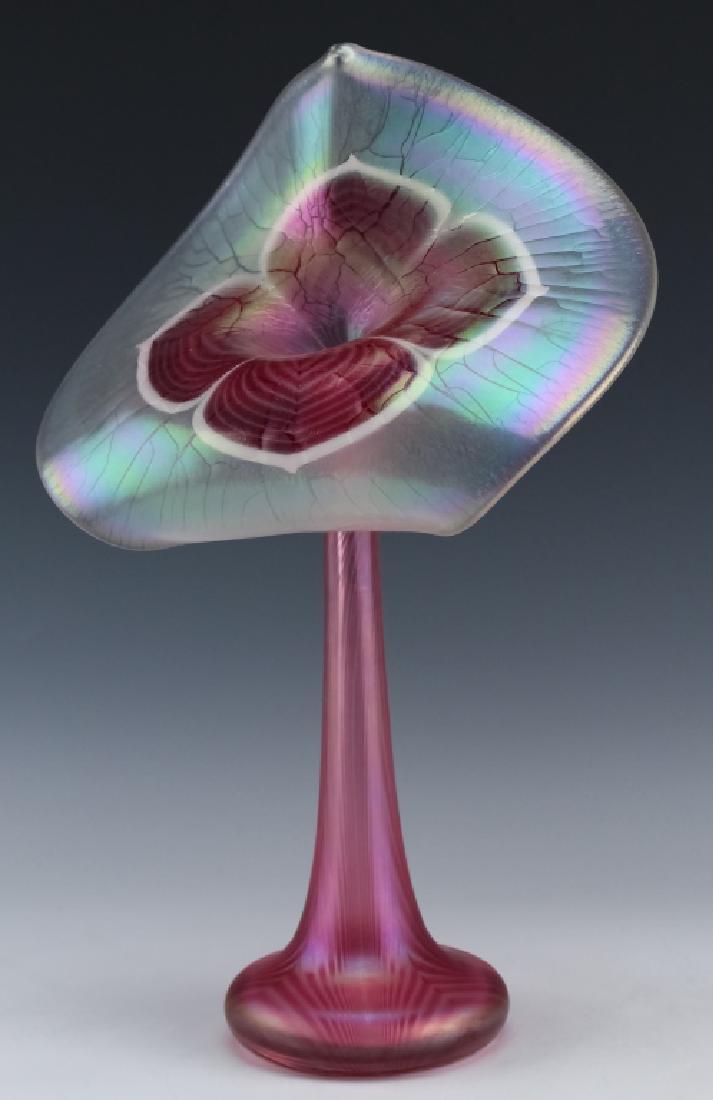 Stuart Ableman Jack In The Pulpit Art Glass Vase: Stuart Ableman American studio art glass jack-in-the-pulpit vase. Guaranteed Authentic. Features the floral form with bright pink pulled feather decoration with iridescent surface throughout. Signed o