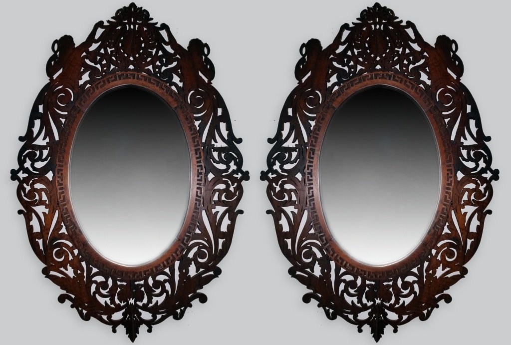 Pair 19th C. Victorian Carved Wood Floral Mirrors: Fabulous pair of antique Victorian era Anglo-Indian pierced fretwork mirrors. Hand crafted of hardwood with filigree floral motif. Crest flanked by female nude nymph figures. Mirror surrounded by Gree