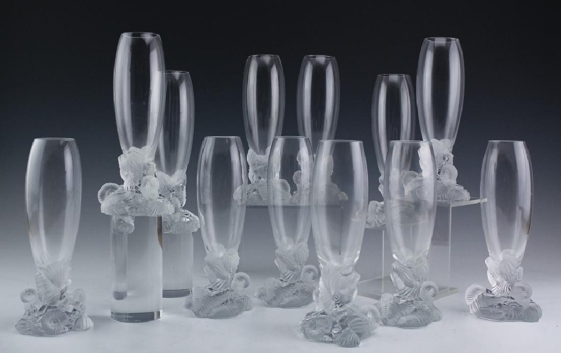 Set 12 Royales De Champagne ATLANTIS Crystal Stems: Set of twelve champagne flute glasses by Royal Crystal works of Champagne. Crafted of fine quality French art glass crystal. Glassware features the "Atlantis" pattern designed by Xavier Froissart, gre