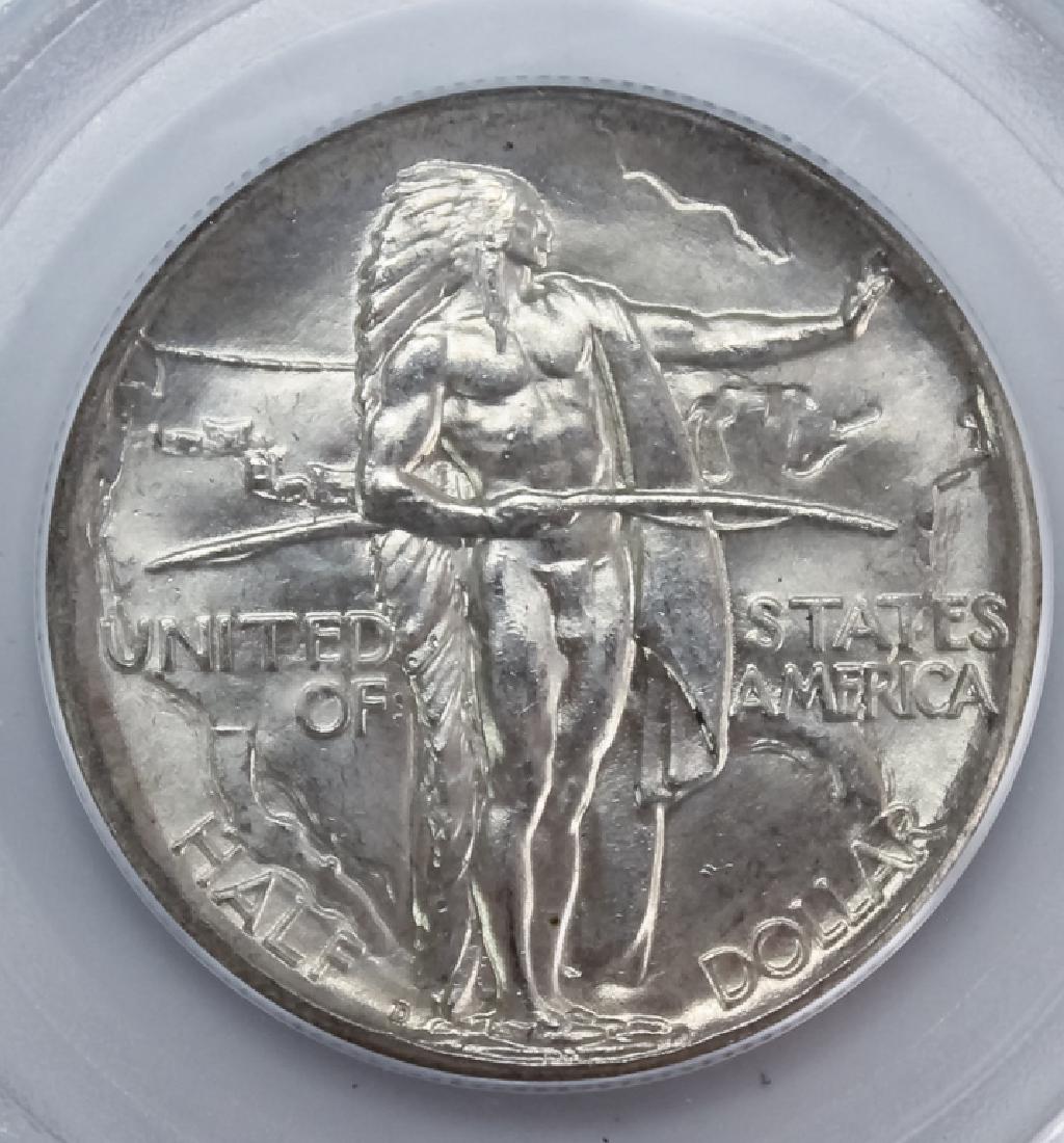 1934 D PCGS MS65 Oregon Commem Half Dollar Coin: 1934 D PCGS graded MS65 silver commemorative United States half dollar, fifty cent piece. This mint state American coin comes in an older generation 3.1 green PCGS holder ( OGH ). Good overall conditi