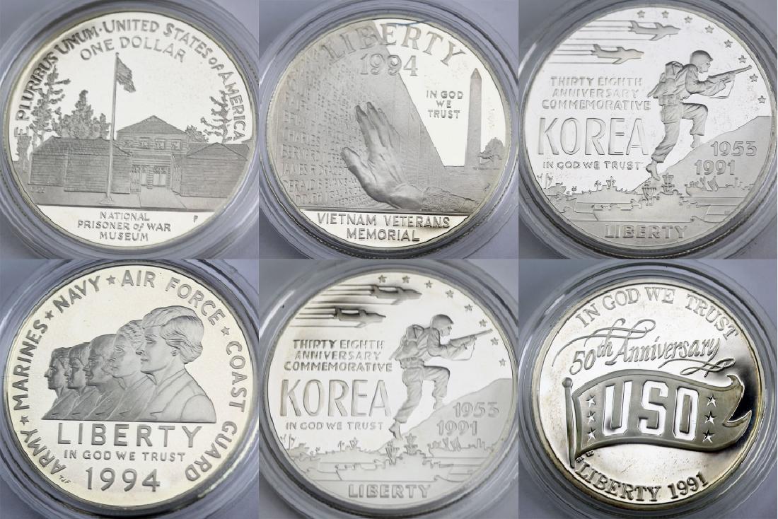 6 US Silver $1 Dollar Military & War Commem Coins: Lot of five war and military related commemorative coins. Includes two proof Korean War Memorial $1 coins, one Vietnam Veterans Memorial proof silver $1, one Women in Military Service $1 proof, One Pr