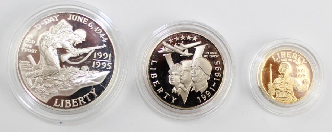 1991 - 1995 World War II 3pc Pf Gold & Silver Set: 1991-1995 WWII 50th Anniversary three piece proof coin set. Comes with a $5 gold quarter eagle, a silver $1 dollar, and clad half dollar. Comes in original government packaging. Good overall condition