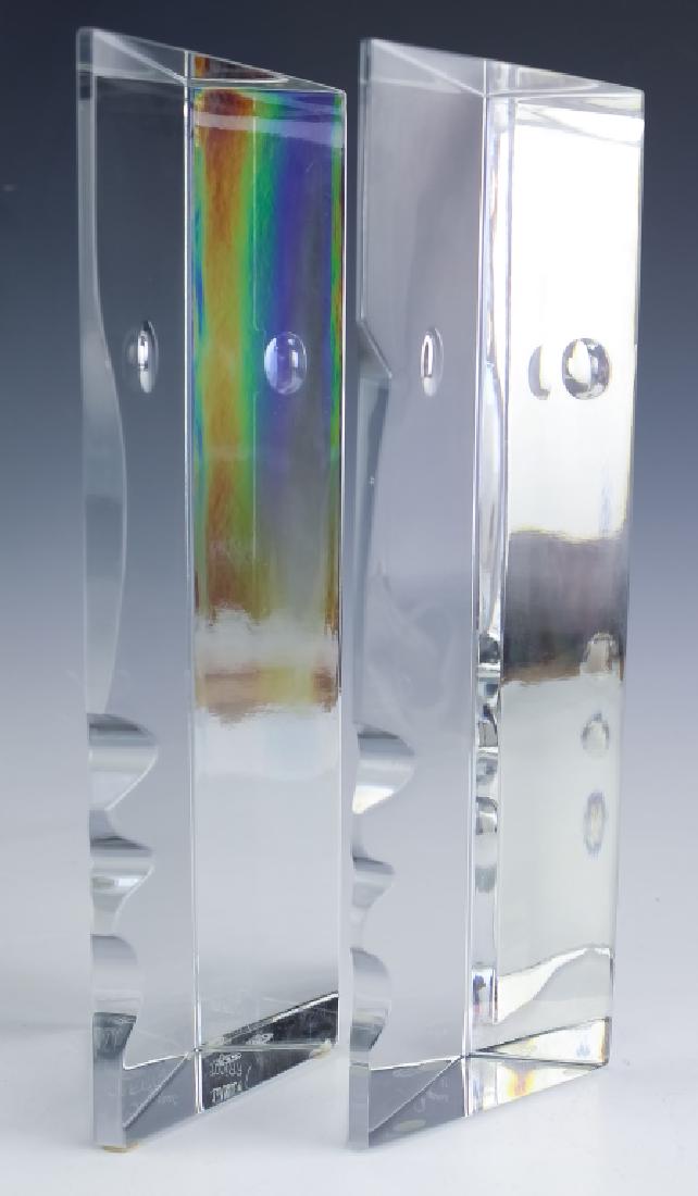 Baccarat Pair of French Art Glass Face Bookends: Pair of bookends by Robert Rigot for Baccarat. Crafted of fine quality French art glass crystal. Features a modernist block face design with triangle forms. Signed with Baccarat acid mark and R. Rigot