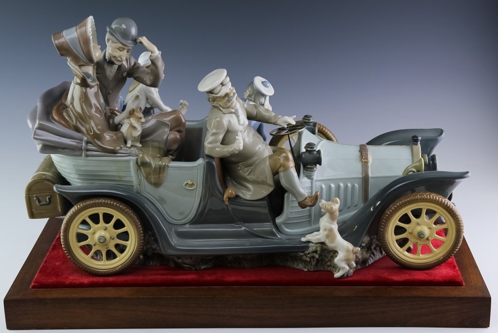 Lladro ANTIQUE CAR 1146 LE Porcelain Sculpture 22": Lladro Spanish porcelain figurine. Features the form titled Antique Car. Reference number 1146. Depicts an antique style automobile fixed to wood base. Signed with Lladro back-stamp on base. Measures 
