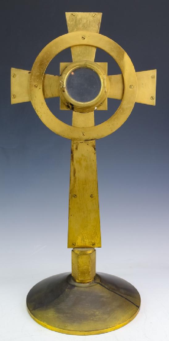 Francois Biais Roman Catholic Monstrance Ostensory: Roman Catholic ostensorium by Francois Biais, France. Features a gilt bronze cross with windowed section for a relic. Signed Francois Biais Paris Made In France. Measures 20 1/2" x 9 1/2". Good overal