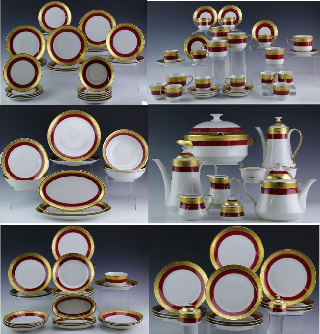 127p Bohemia Gilt Cranberry & White Fine China SET: Bohemia Czechoslovakia ninety five piece porcelain china set. Each piece is decorated with with a raised gilt decoration depicting a Romanesque scene. undernethe the gilt band is a hand painted band o